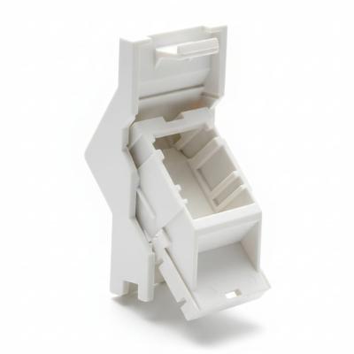 Angled shutter module for RJ45 keystone jacks